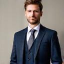 Portrait of James Croft in a tailored suit